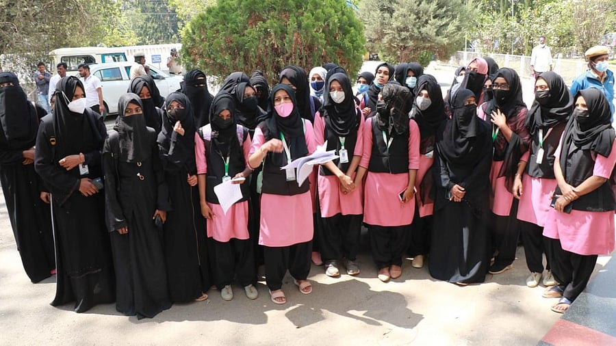 About 39 students of KLE Society’s Lingaraj College in Belagavi staged a protest near the deputy commissioner’s office seeking permission to wear hijab. Credit: DH Photo