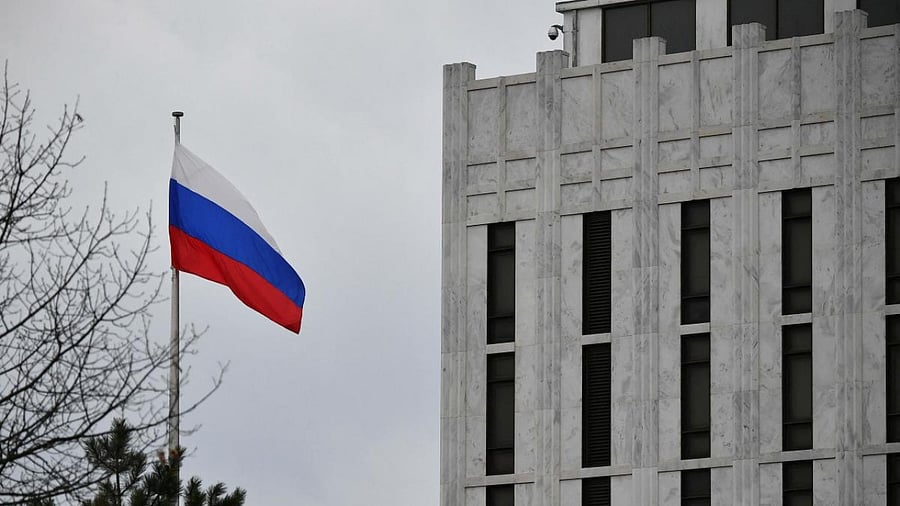 A Russian flag flutters in front of Russia‘s Embassy in Washington DC. Credit: AFP Photo