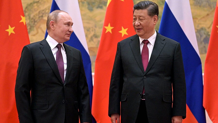 Vladimir Putin with Xi Jinping. Credit: AP/PTI Photo