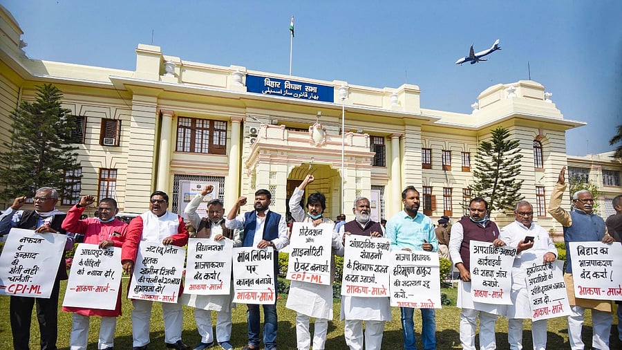 Communist Party of India (Marxist–Leninist) legislators stage a protest outside Bihar Assembly, during the Budget Session, in Patna. Credit: PTI Photo