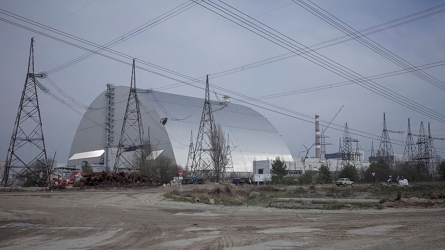 A general view shows a New Safe Confinement structure over the old sarcophagus covering the damaged fourth reactor at the Chernobyl nuclear power plant, in Chernobyl. Credit: Reuters Photo