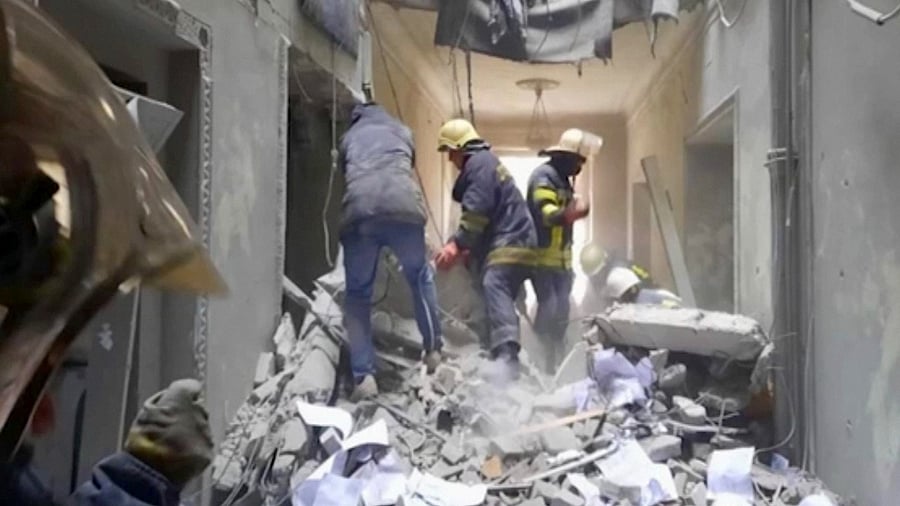 Russian shelling pounded civilian targets in Ukraine's second-largest city, Kharkiv, Tuesday and a 40-mile convoy of tanks and other vehicles threatened the capital. Credit: AP/PTI Photo