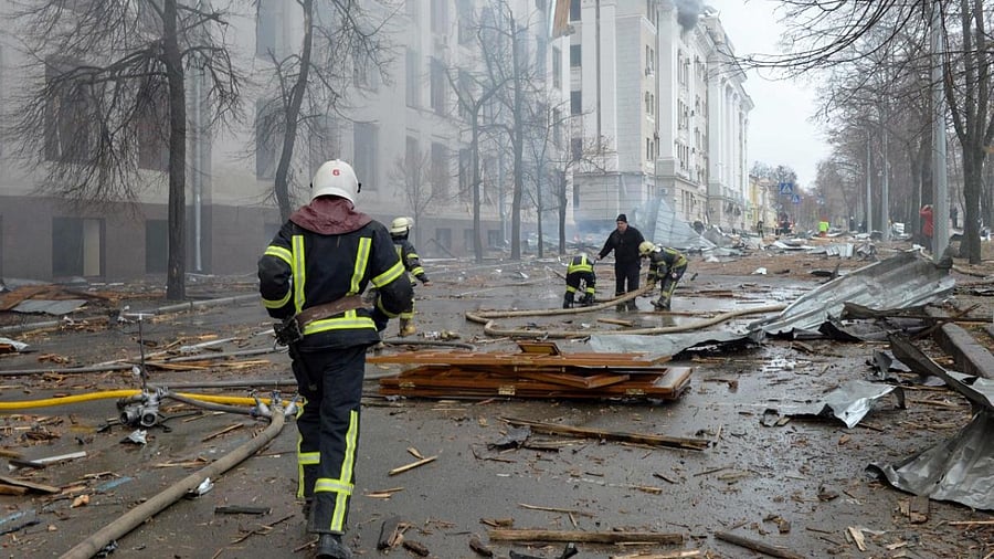 Firefighters work to contain a fire at the Economy Department building of Karazin Kharkiv National University, allegedly hit during recent shelling by Russia, in Kharkiv. Credit: AFP Photo