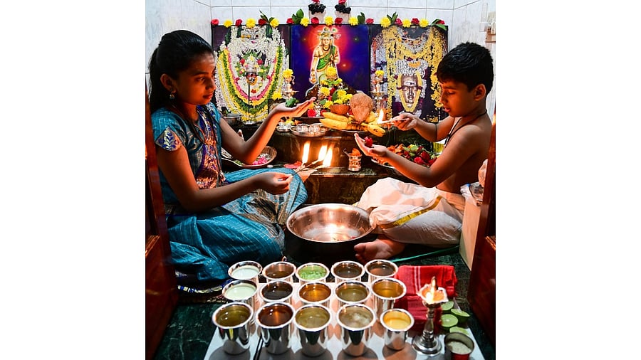 Kids perform Ishtalinga Puja at a home in Laggere, Bengaluru, on Maha Shivarathri. Credit: DH Photo/M S Manjunath