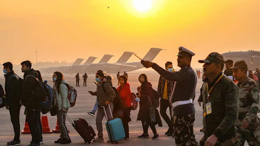 Indian nationals, evacuated from crisis-hit Ukraine, upon their arrival at the Hindon Air Force Station in Ghaziabad. Credit: PTI Photo
