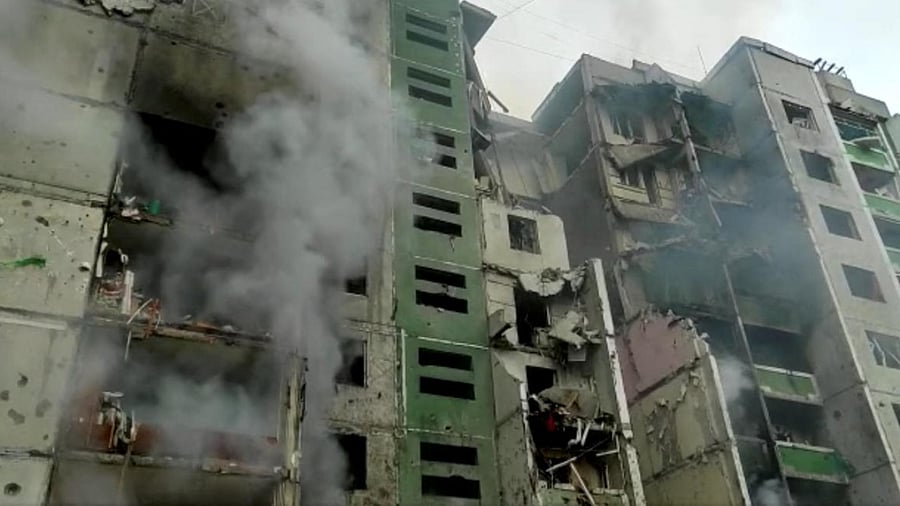 Fumes from dilapidated buildings are seen after the shelling attack by the Russian army, following Russia's invasion of Ukraine, in Chernihiv. Credit: Reuters photo/State Emergency Services Of Ukraine