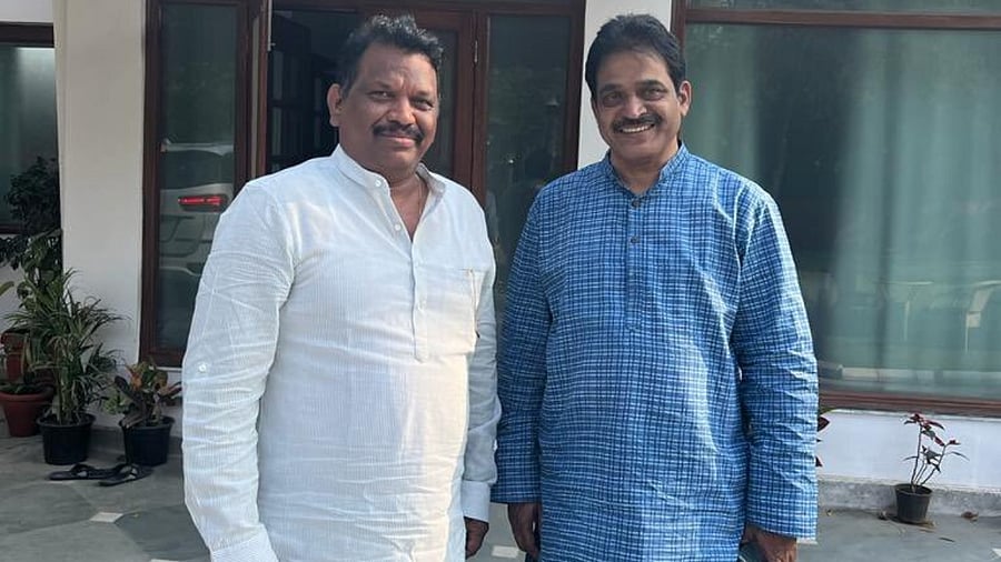 Congress leader Michael Lobo with AICC general secretary K C Venugopal. Credit: Twitter/@MichaelLobo76