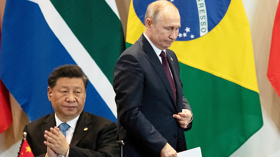 China's President Xi Jinping, left, and Russia's President Vladimir Putin. Credit: Reuters Photo