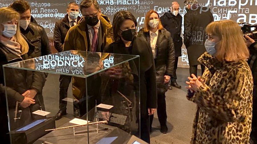 German Foreign Minister Annalena Baerbock visits an exhibition at the Holodomor Museum in Kyiv, Ukraine. Credit: Reuters Photo