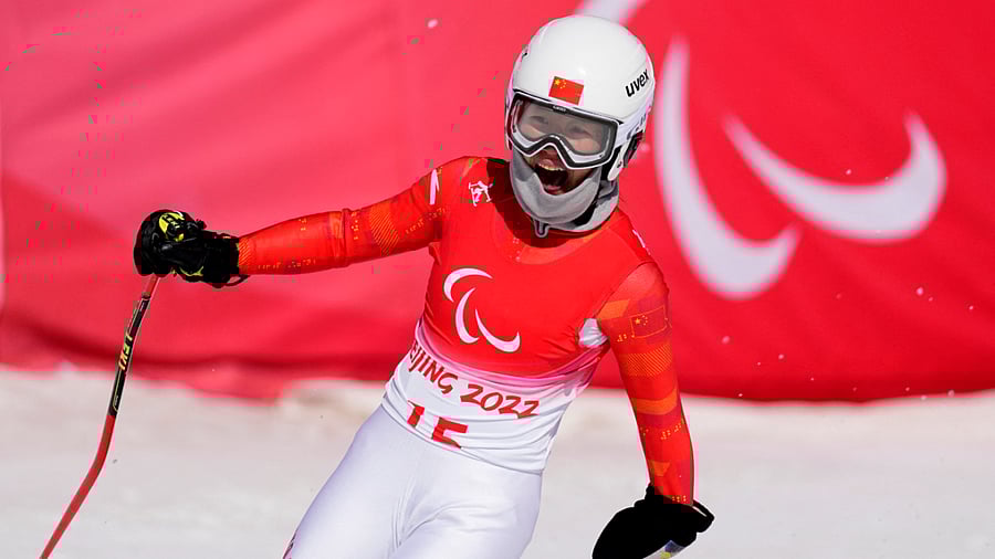 Zhang Mengqiu of China reacts after her run. Credit: Reuters Photo