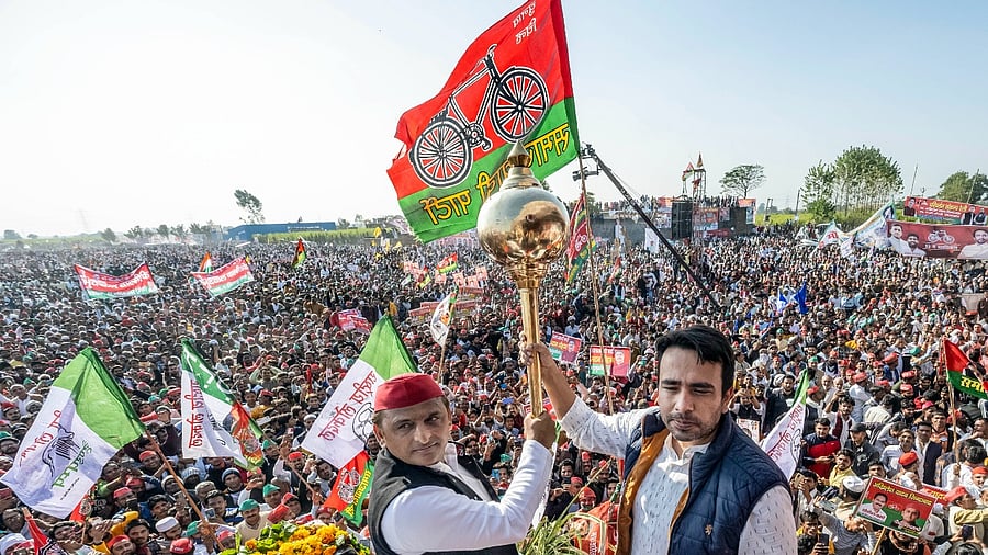 Akhilesh Yadav of the SP with Jayant Chaudhary of RLD. Credit: PTI Photo