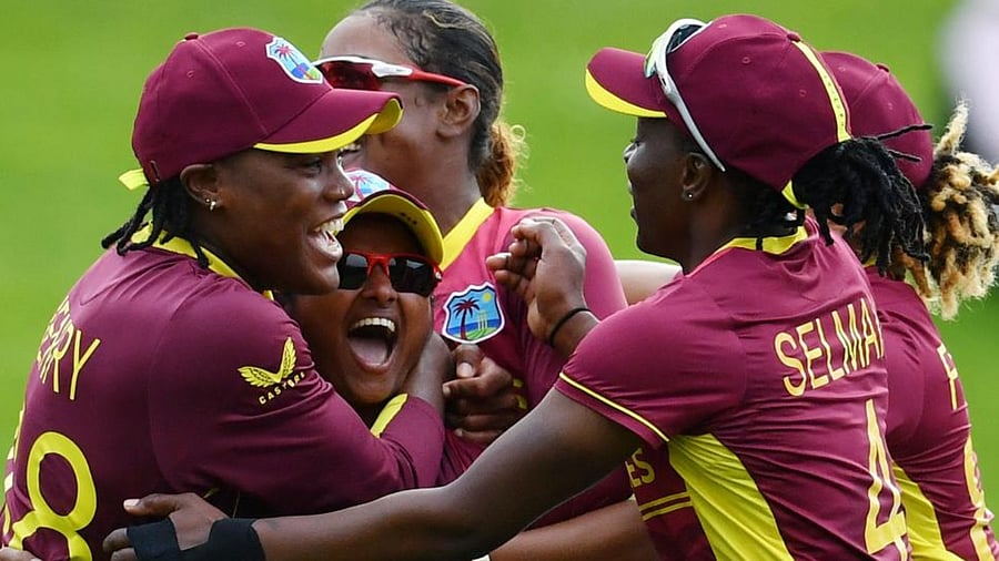 West Indies players celebrate their victory at the end of the Round 2 Women's Cricket World Cup match between England and West Indies at University Oval in Dunedin on March 9, 2022. Credit: AFP Photo