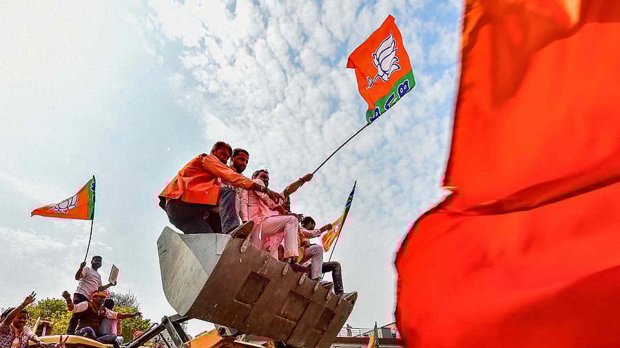 Supporters of India's Bharatiya Janata Party (BJP) celebrate outside the party office in Lucknow. Credit: AFP Photo
