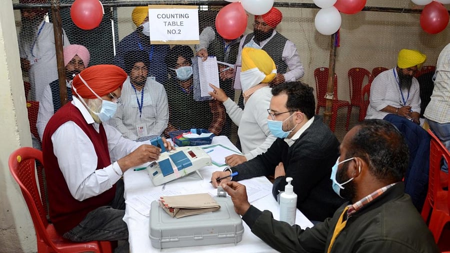 Election staff during counting day of Punjab Assembly elections, at a counting centre in Amritsar district, Thursday, March 10, 2022. Credit: PTI Photo