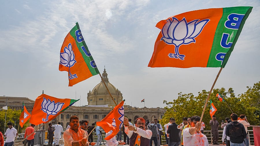 Narendra Modi's charisma and Yogi Adityanath's popularity formed a winning combination and helped the BJP overcome all speedbreakers in its ride back to power. Credit: PTI Photo