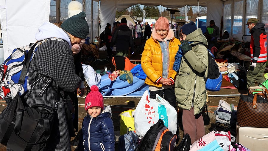 People fleeing Russia's invasion of Ukraine arrive in Medyka. Credit: Reuters Photo