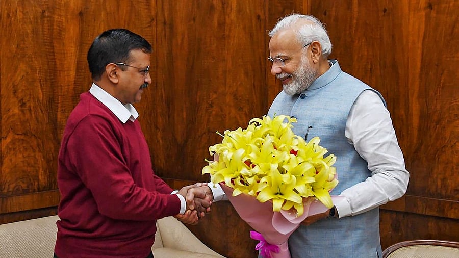A file photo of Arvind Kejriwal (L) with PM Narendra Modi. Credit: PTI Photo