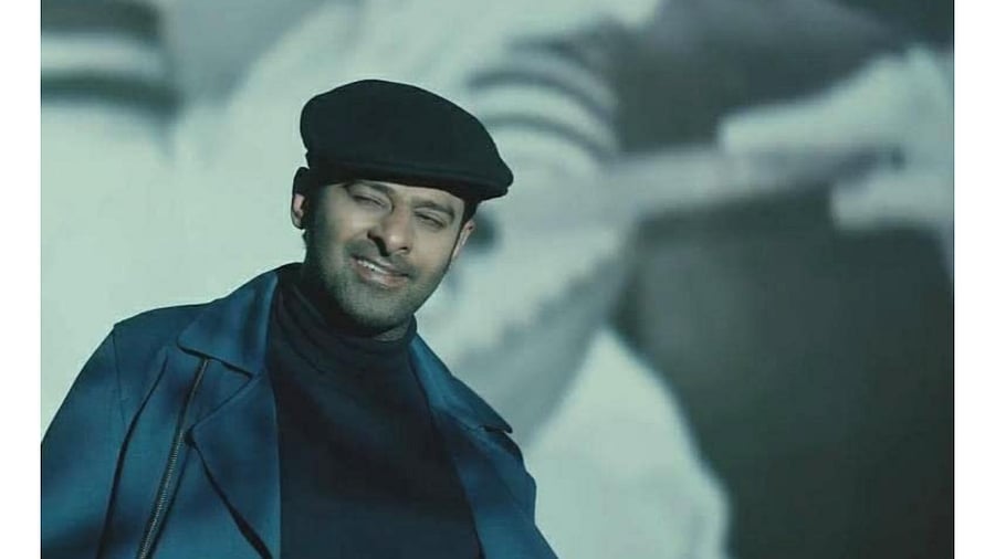 Prabhas in a still from 'Radhe Shyam'. Credit: IMDb