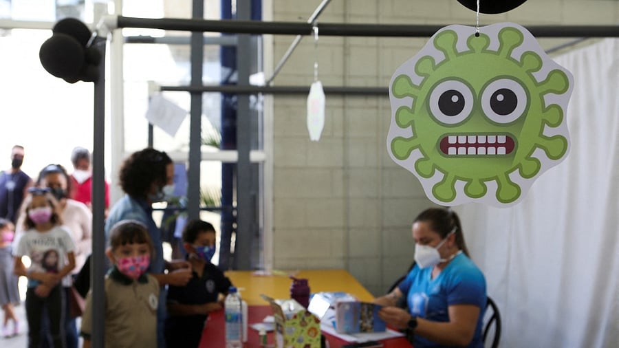 Two doses of Pfizer-BioNTech Covid-19 vaccine reduced the risk of Omicron infection by 31 per cent among children aged five to 11, and by 59 per cent among adolescents aged 12 to 15. Credit: Reuters Photo