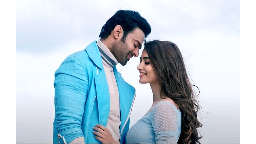 Prabhas, Pooja Hegde in a still from 'Radhe Shyam'. Credit: Twitter/@DirectorMaruthi