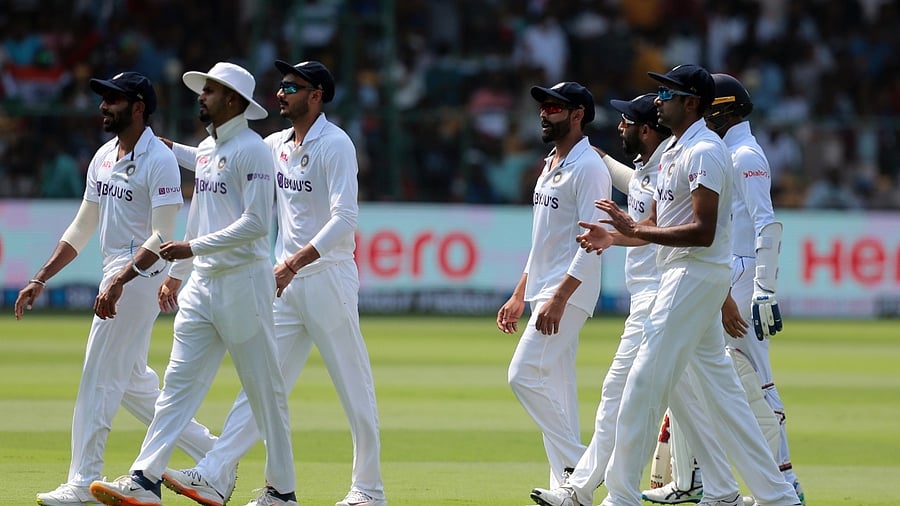 India's Jasprit Bumrah, walks off the field with teammates after his five-wicket haul. Credit: IANS Photo