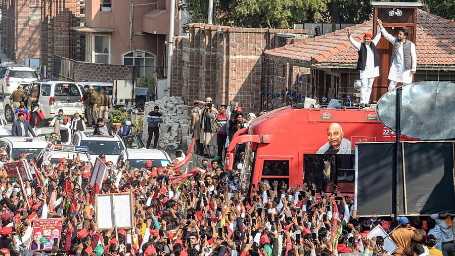 Samajwadi Party chief Akhilesh Yadav with RLD leader Jayant Choudhary during an election campaign meeting for UP Assembly polls, in Ghaziabad, Saturday, Jan. 29, 2022. Credit: PTI Photo