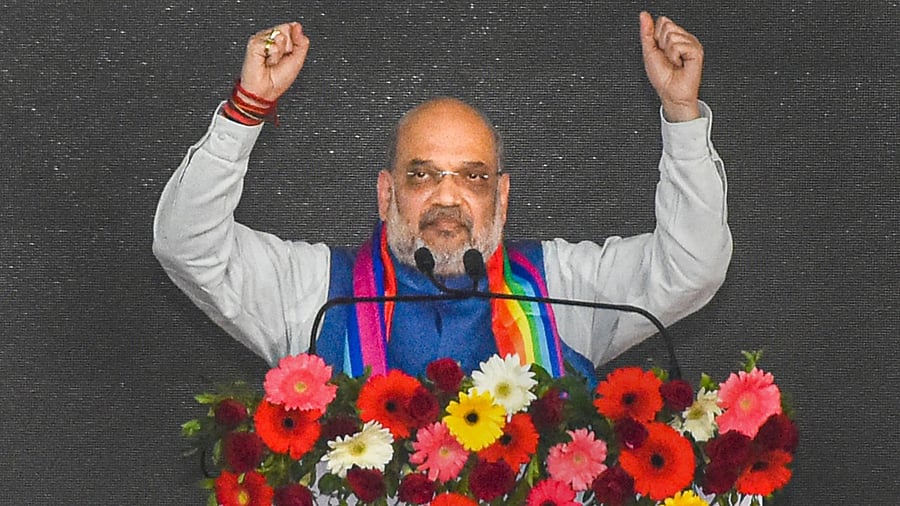 Union Home Minister Amit Shah addresses the inauguration and foundation stone laying ceremony of various schemes of Surat District Co-operative Milk Producers' Union Limited (Sumul Dairy), in Surat. Credit: PTI Photo