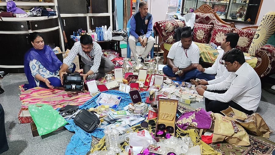 So far, the officials have found a large quantity of gold jewellery, property documents and Sandalwood. Credit: ACB officials