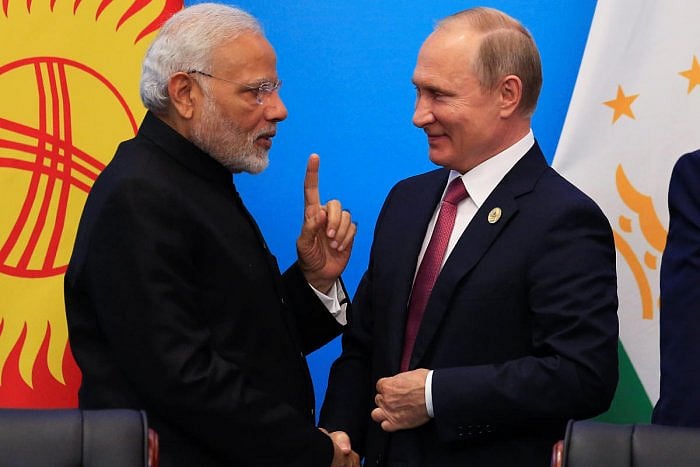 Prime Minister Narendra Modi and Russian President Vladimir Putin at the signing ceremony during the Shanghai Cooperation Organisation (SCO) summit in Qingdao, China. Credit: Reuters File Photo
