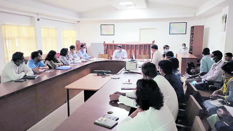 Deputy Commissioner Dr Rajendra K V chairs a meeting in Mangaluru.