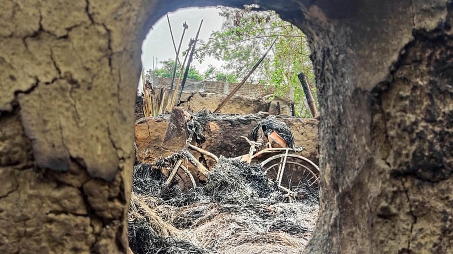 A view of the burnt house after a mob allegedly set ablaze around 10-12 houses and at least eight persons were burnt to death on Monday late night, at Bogtai, in Birbhum on Wednesday, March 23, 2022. Credit: PTI File Photo