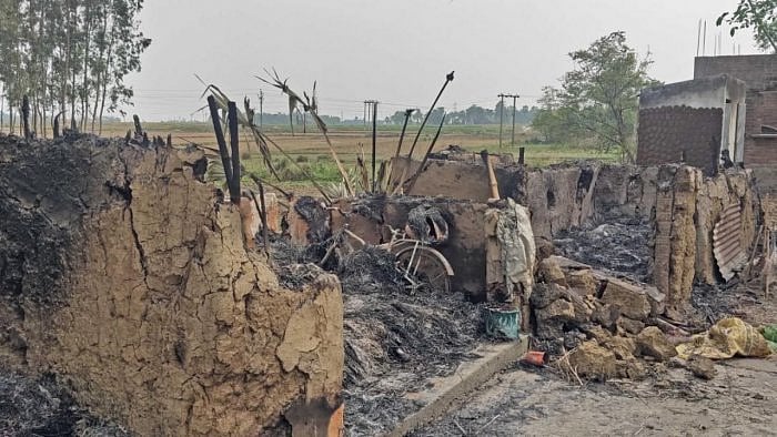 A view of the burnt house after a mob allegedly set ablaze around 10-12 houses and at least eight persons were burnt to death on Monday late night, at Bogtai, in Birbhum on Wednesday, March 23, 2022. Credit: IANS Photo