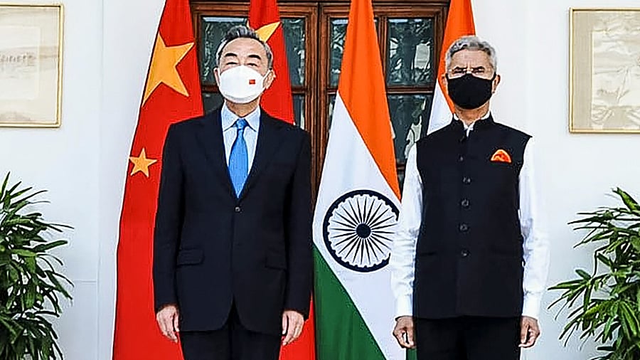 Wang Yi and Jaishankar in New Delhi. Credit: PTI Photo