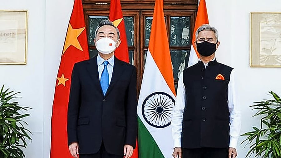 External Affairs Minister S Jaishankar with China's Foreign Minister Wang Yi during their meeting at Hyderabad House in New Delhi. Credit: PTI Photo