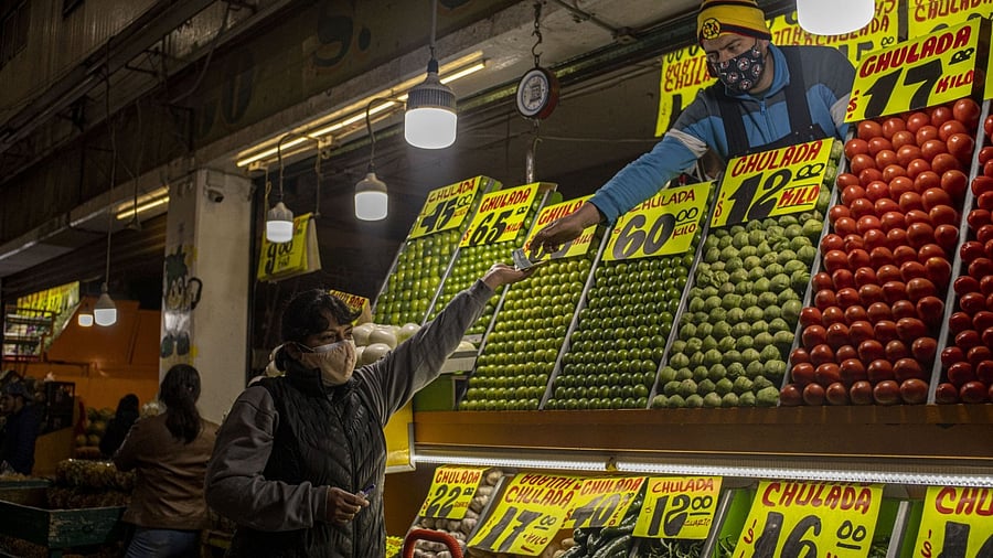  More-expensive food may be frustrating to the middle class, but it’s devastating to communities trying to claw their way out of poverty. For some, “demand destruction” will be a bloodless way to say “hunger.” Credit: Bloomberg Photo