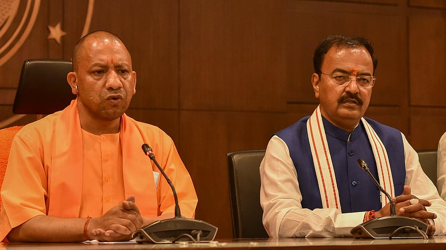 UP deputy chief minister Keshav Prasad Maurya (R) faced criminal cases, including attempt to murder and wrongful restrain among others. Credit: PTI File Photo