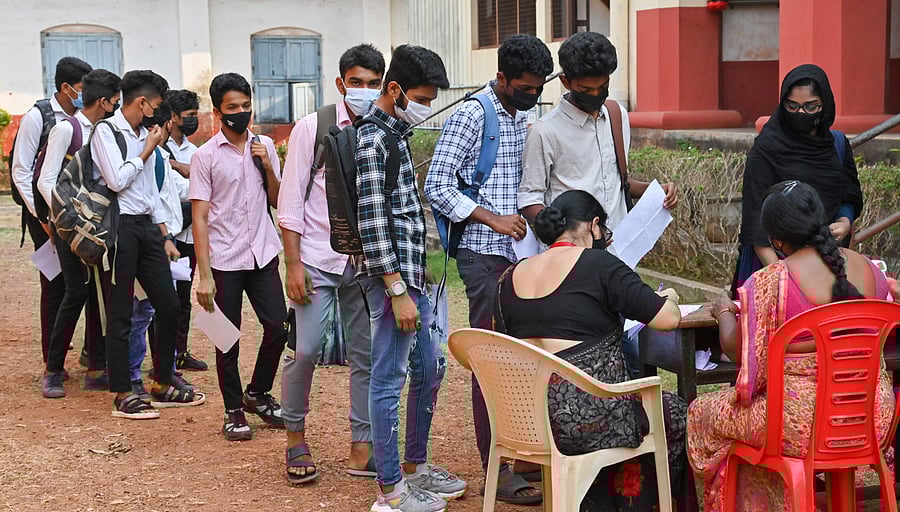 Students arrive for the SSLC exam at Ganapathi High School in Mangaluru. Credit: DH Photo/Irshad Mahammad