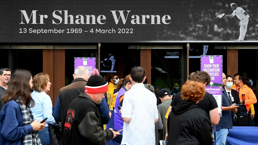 The larger-than-life "king of spin" was being honoured in a two-hour service in front of about 50,000 fans that was beamed live to cricket grounds across Australia and watched around the world. Credit: AFP Photo