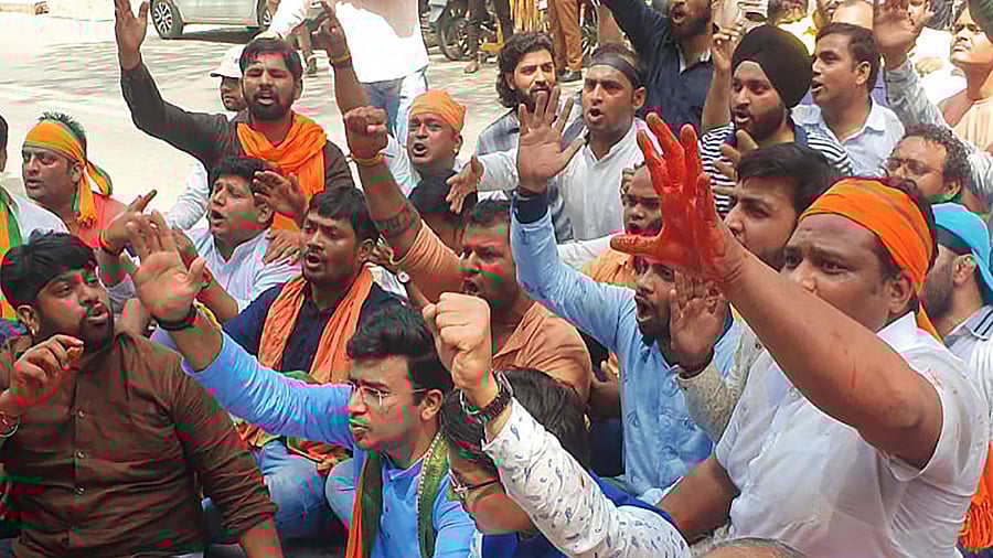 Bharatiya Janata Yuva Morcha President Tejasvi Surya leads a protest against Chief Minister Arvind Kejriwal’s speech in the Delhi Assembly on the Bollywood movie The Kashmir Files. Credit: PTI Photo