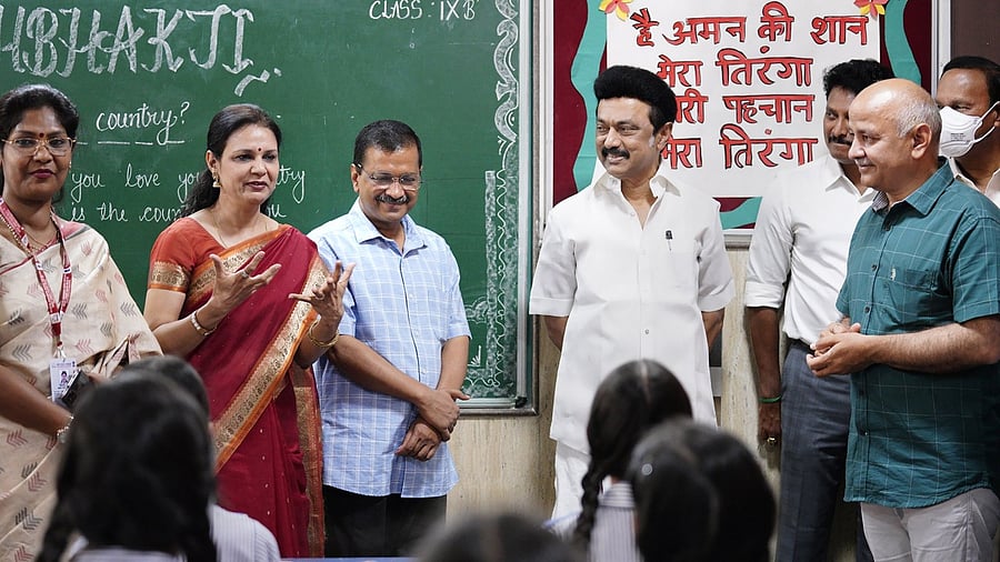Tamil Nadu CM MK Stalin, Delhi CM Arvind Kejriwal and Dy CM Manish Sisodia visit a government school, in New Delhi. Credit: PTI Photo