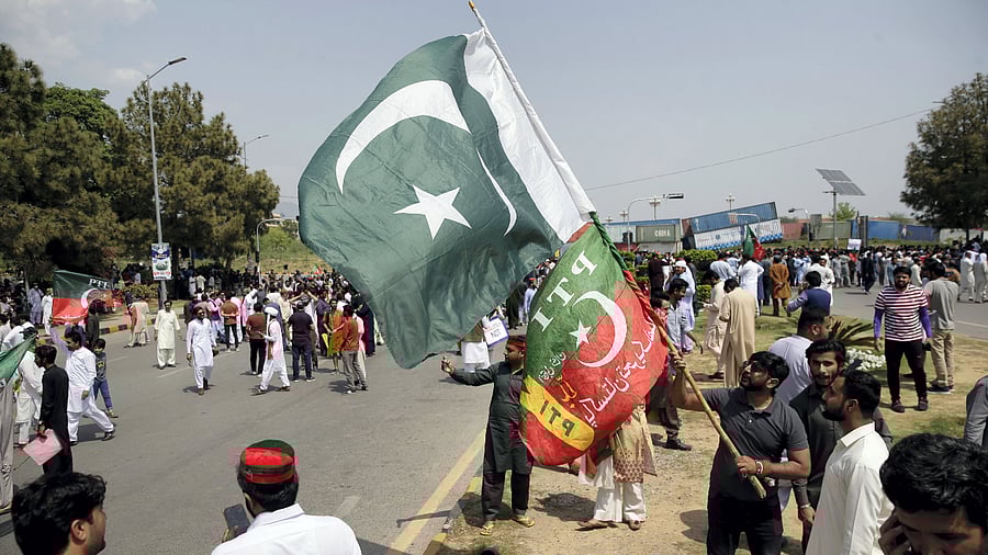 Supporters of ruling party Pakistan Tehreek-e-Insaf (PTI) gather during a protest in Islamabad, Pakistan. Credit: AP Photo