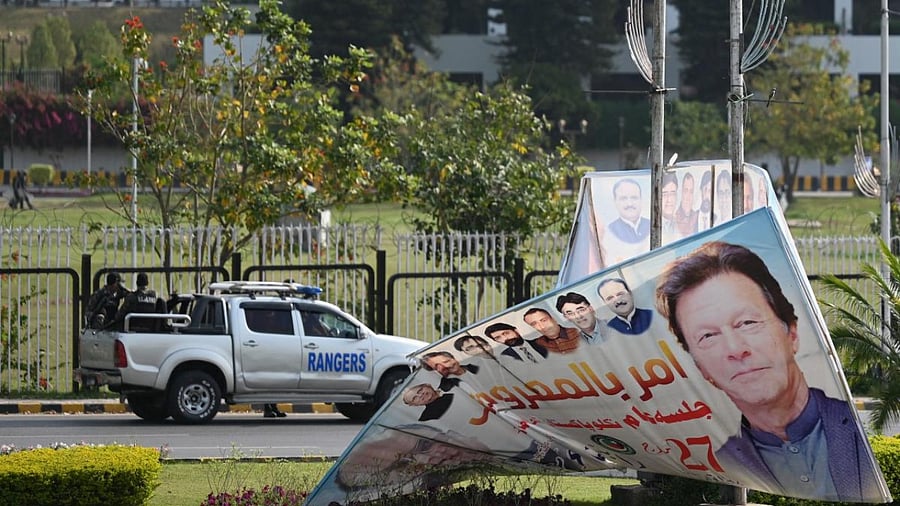 Security personnel patrol in front of the Parliament House building in Islamabad on April 3, 2022 as Prime Minister Imran Khan called on his supporters to take to the streets today ahead of a parliamentary no-confidence vote that could see him thrown out of office. Credit: AFP Photo