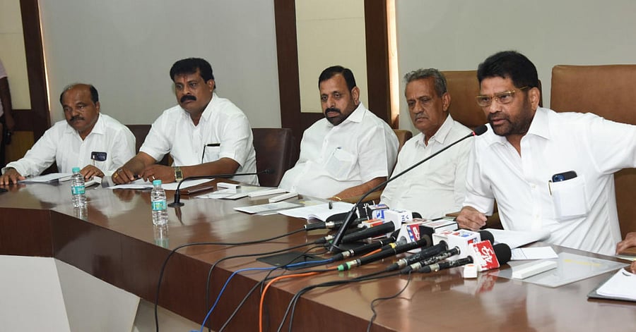 SCDCC Bank President M N Rajendra Kumar addresses reporters in Mangaluru on Sunday. DH photo