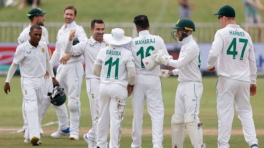 Left-arm spinner (C) Keshav Maharaj collected 7-32 and offspinner Simon Harmer 3-21. Credit: AFP Photo