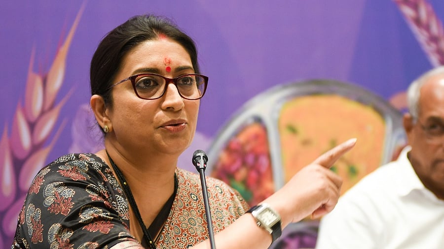 Union Minister for Women and Child Development Smriti Irani addresses a press meet in Bengaluru on Monday. State Women and Child Welfare Minister Halappa Basappa Achar is also seen. DH Photo/ B H Shivakumar
