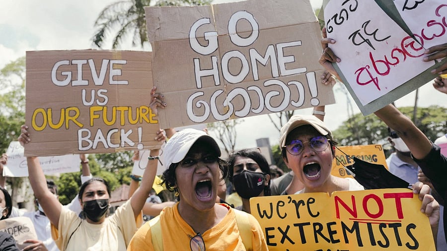 People shout slogans against Sri Lanka's President Gotabaya Rajapaksa and demand that Rajapaksa family politicians step down, during a protest amid the country's economic crisis, at Independence Square in Colombo, Sri Lanka. Credit: Reuters Photo