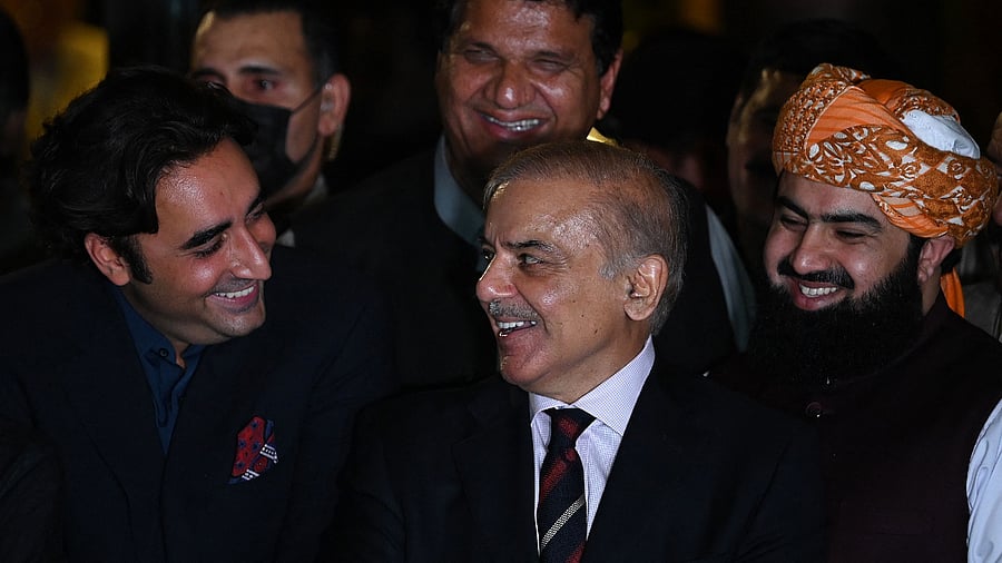 Pakistan's opposition leader Shahbaz Sharif (C) and Bilawal Bhutto Zardari (R). Credit: AFP Photo