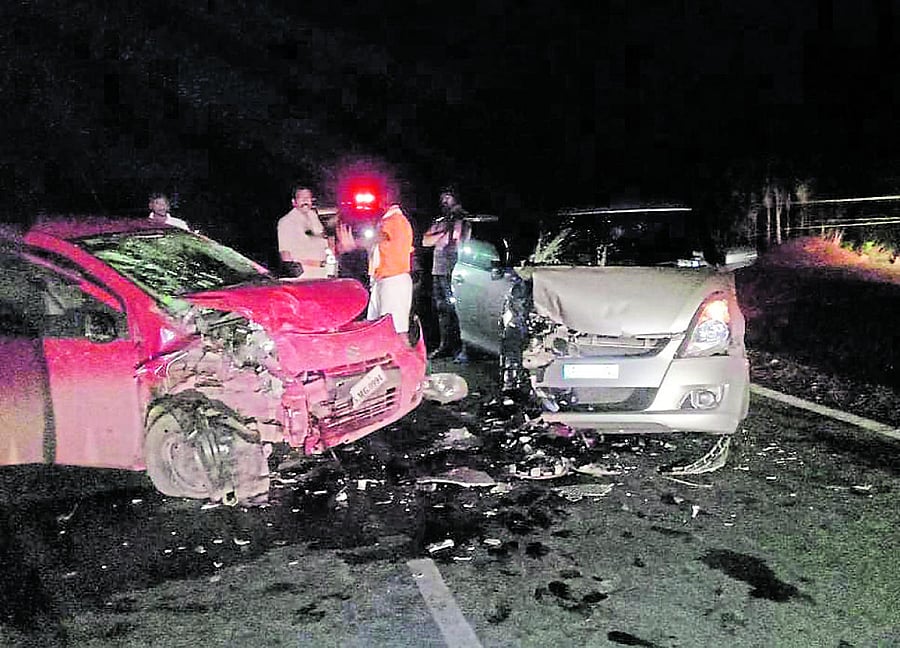The mangled remains of cars involved in the accident.