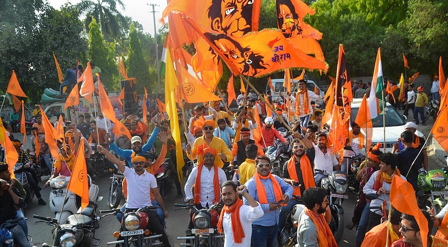 Vishva Hindu Parishad (VHP) and Bajrang Dal activists take out a bike rally, ahead of the festival of 'Ram Navami', in Mirzapur. Credit: PTI