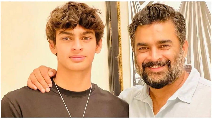 Madhavan with his son. Credit: IANS Photo